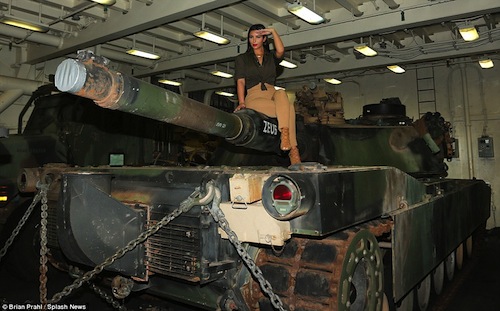 23A38E7100000578-2856317-The_perfect_photo_op_Kimmy_climbed_on_top_of_a_tank_for_a_snap-55_1417464091544