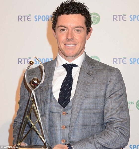Rory McIlroy poses with his trophy after winning the 2014 RTE Sports Person of the Year Award