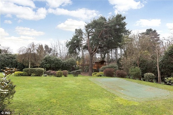 The Oxshott mansion is nestled in the wealthy suburb and boasts a large garden and beautiful views