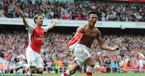 ALEXIS SANCHEZ celebrated for his shirtless goal for Arsenal against Manchester City in the 2014 Premier League game