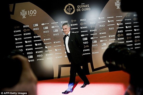 Jose Mourinho poses for a photo on the red carpet as he is named Portugal's coach of the century