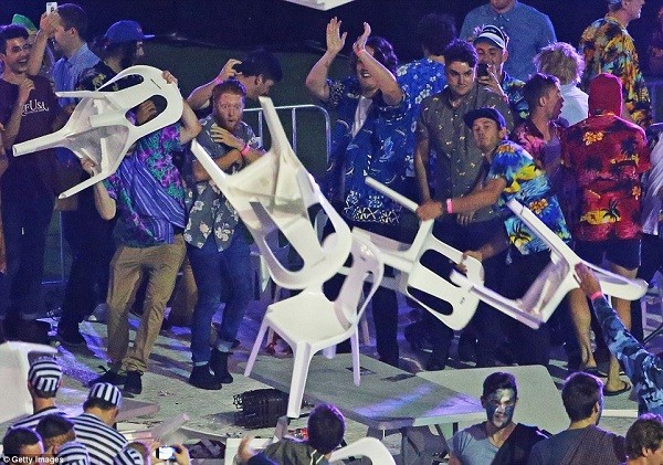 The evening got out of hand when fans started throwing the white plastic chairs