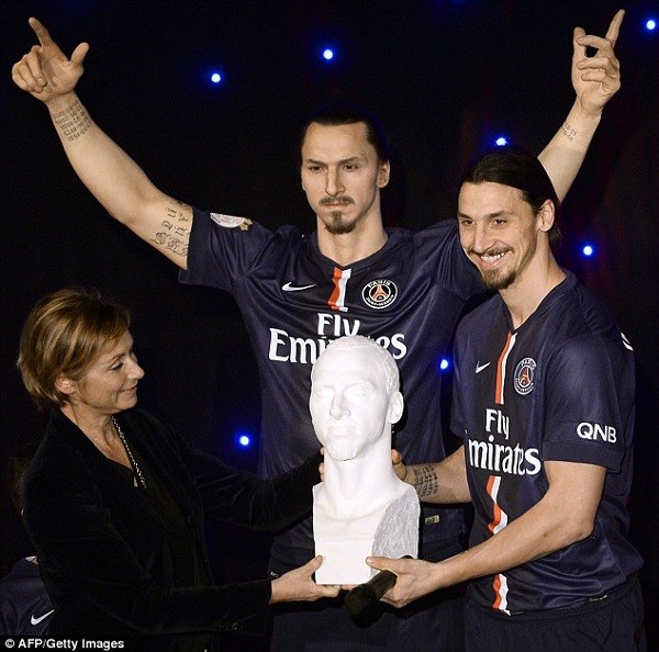 Ibrahimovic (right) was presented with the plaster cast and elastomer used to make the waxwork