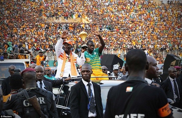 Ouattara and Toure paraded the trophy in front of thousands of fans at the Felix Houphouet-Boigny stadium in Abidjan
