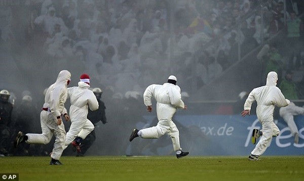 The real violence started as fans ran away from the police to try and return to the stands