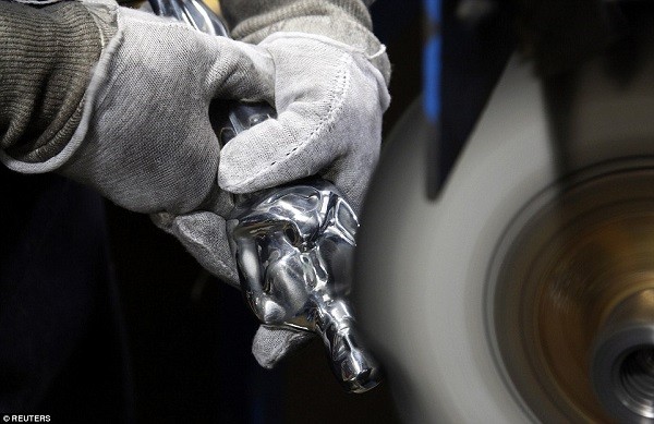 The statues are painstakingly sanded by hand to match their iconic 1928 design. The slightest blemish leads to the figure being scrapped and started over