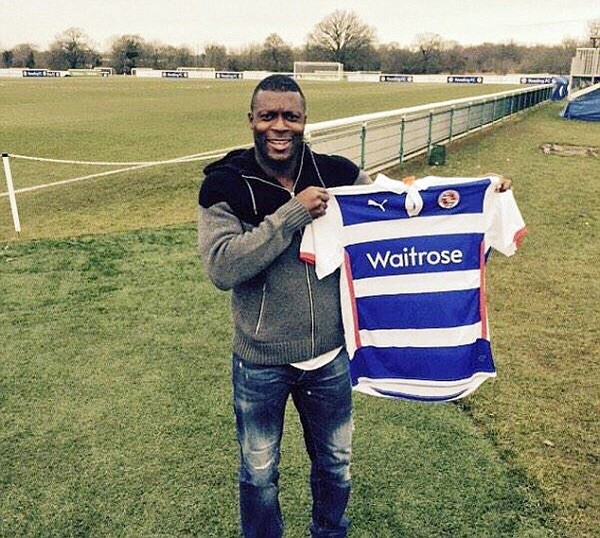 Yakubu poses with Reading shirt after signing a short-term deal with Steve Clarke's Championship side