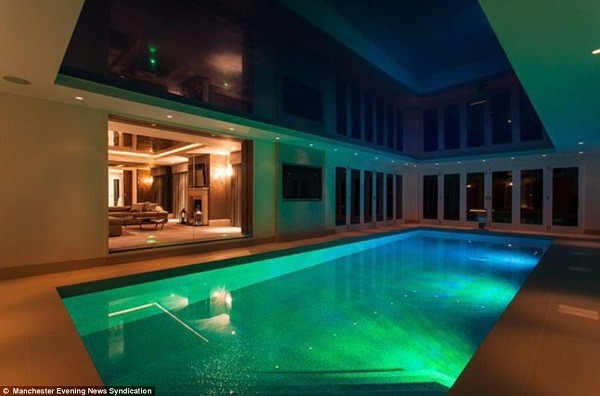 A night-time photograph of the swimming pool inside the mansion which Di Maria was renting