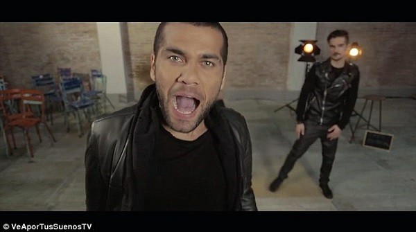 Dani Alves (centre) has released a charity single alongside former Barcelona team-mate Jose Pinto