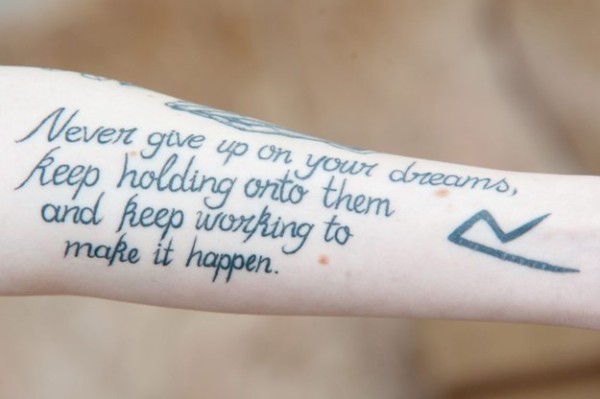 Fan-Covers-Body-In-Rihanna-Tatooos-2jpg