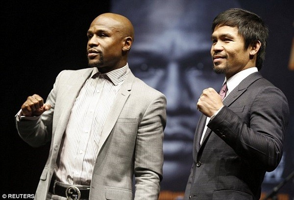 Floyd Mayweather and Manny Pacquiao face-off at their Los Angeles press conference on Wednesday