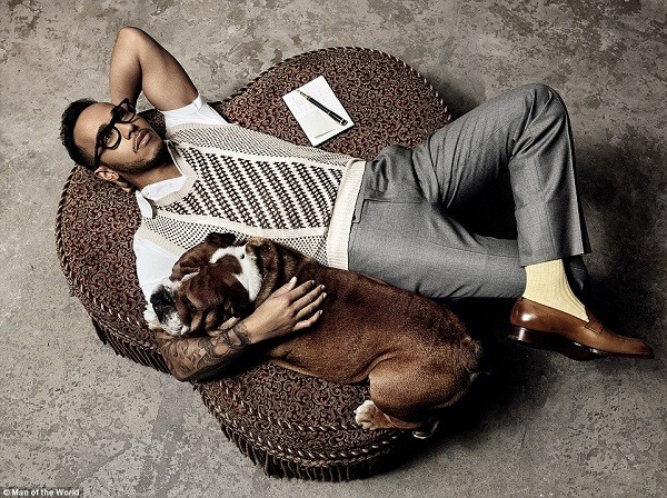 Hamilton, pictured posing with his British bulldog Roscoe, opens up in an intimate interview in the new issue