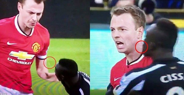 Jonny Evans and Papiss Cisse