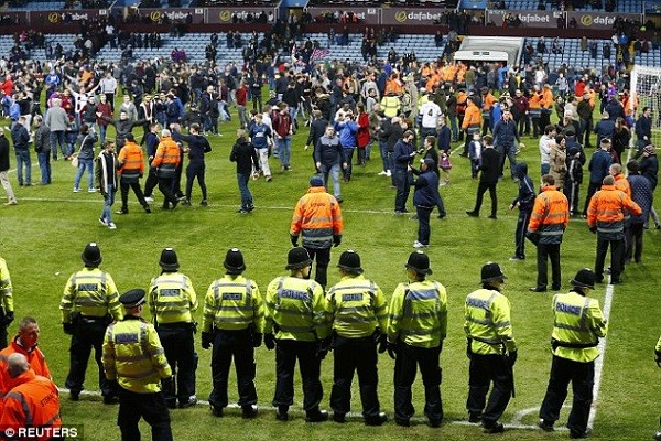 Meagre numbers of police and stewards attempted to deal with the hundreds who invaded the field of play