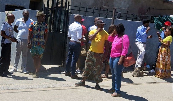 Neighbours standing outside Flabba's home