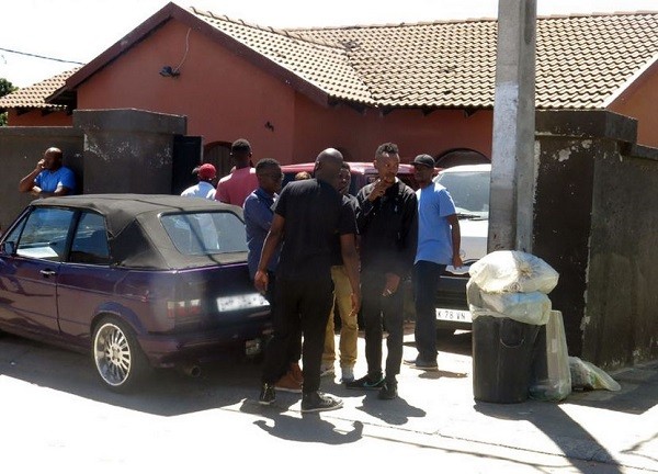 Neighbours standing outside Flabba's homee