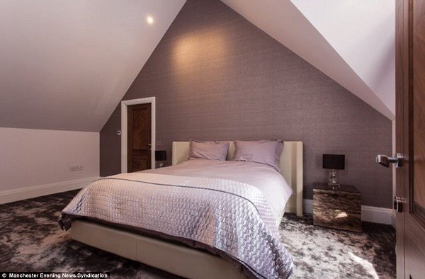 One of the six bedrooms in the luxury mansion that is now being put up for sale following the break-in