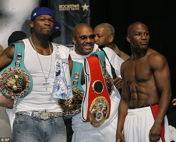 The rapper (left), pictured with Mayweather (right) in 2007, would pocket £1.5m Pacquiao is defeated