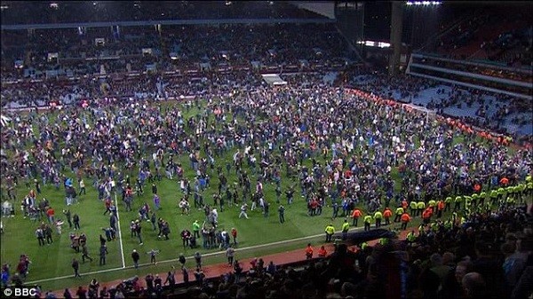 The scene at Villa Park as hundreds of jubilant fans stormed the pitch shortly after the final whistle