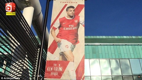 An image of former Arsenal star Cesc Fabregas hangs from the Ken Friar Bridge at the Emirates Stadium