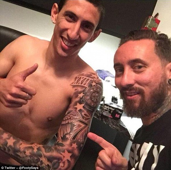 Angel Di Maria (left) has got a new No 7 tattoo which is visibly pronounced on his left arm