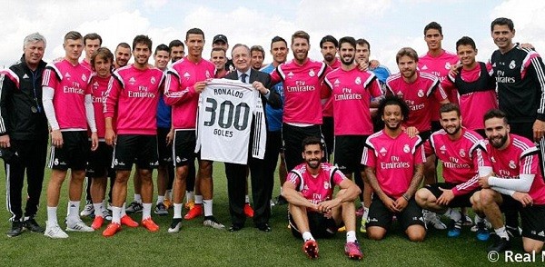 Cristiano Ronaldo was presented with a shit with '300 goals' on the back by Real Madrid club president Florentino Perez on Friday