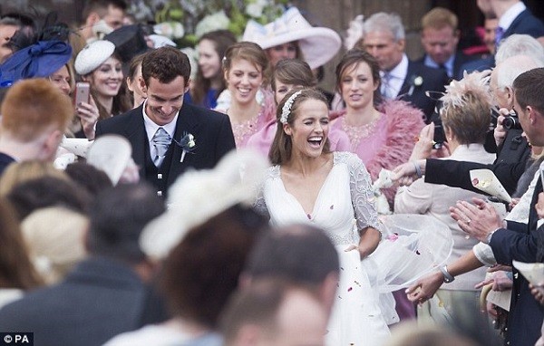 Kim shows her delight after marrying British tennis star Murray on Saturday afternoon