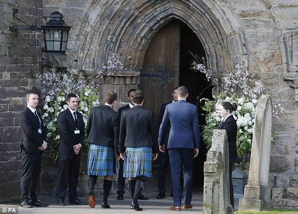 Murray and his brother walk into the church as they begin preparations for his wedding to Kim Sears