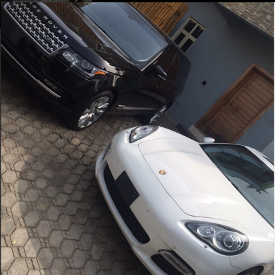 The new white Porsche and his Range Rover sport