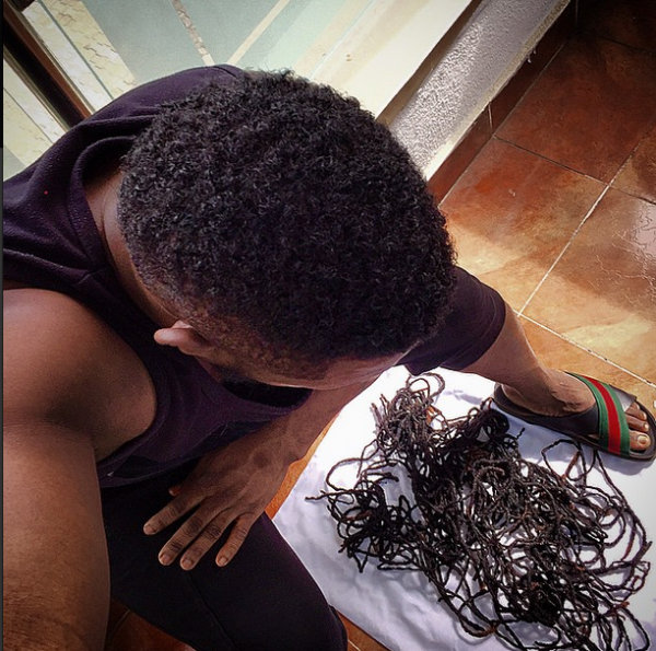 (Timaya shows off his 3 years old dread locks. Photo: instagram)