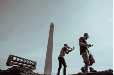 Usher on stage with Common