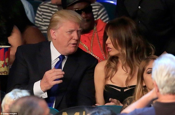 American billionaire Donald Trump wasn't going to miss the fight - along with wife Melania