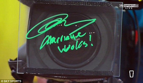Andy Murray is evidently enjoying married life having signed the on-court camera in Madrid 'marriage works'