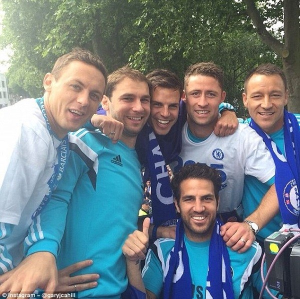 Cahill is all smiles as he stands next to fellow defenders Branislav Ivanovic, Azpilicueta and Terry