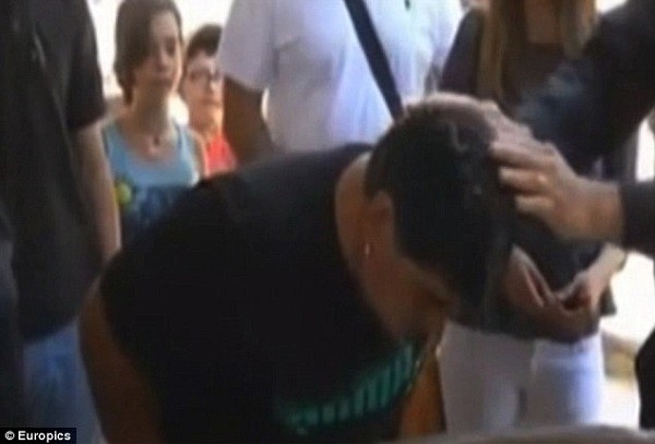 Diego Maradona was baptised in the River Jordan on a visit to the country on Wednesday