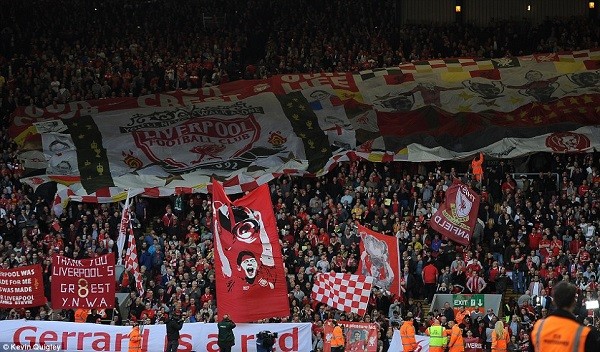 Giant flags and banners were held aloft to welcome Liverpool's loyal servant