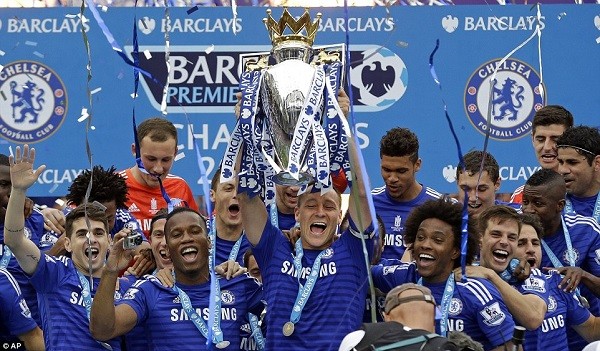 John Terry lifts the Premier League title as Chelsea can finally celebrate after winning the competition earlier this month