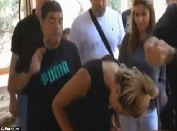 Maradona visited the country with his 24-year-old fiance Rocio Oliva, who was also baptised