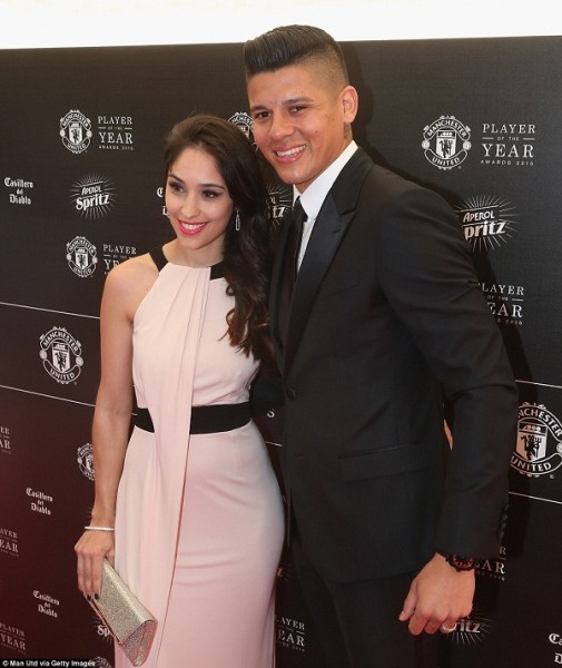 Marcos Rojo is all smiles on Tuesday night as he arrives with Eugenia Lusardo at the Man United Player of the Year awards at Old Trafford