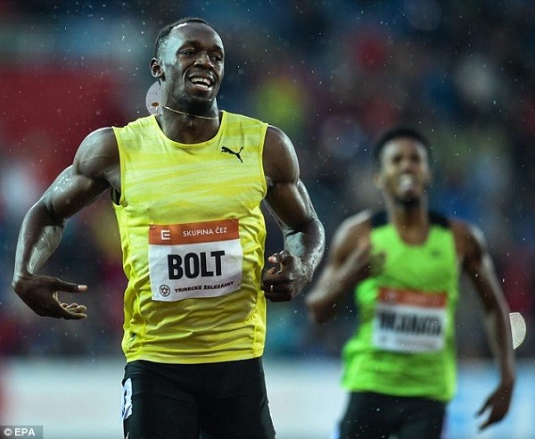 Usain Bolt crosses the finish line in first place after his 200m race at the IAAF World challenge Golden Spike