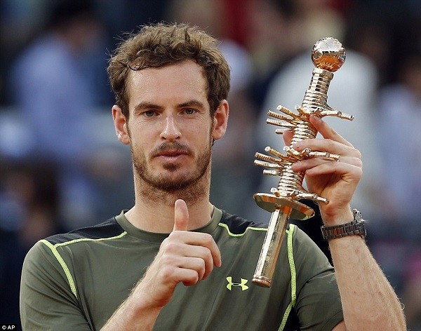 World No 3 Andy Murray gives a thumbs up posing with the Madrid Open trophy, having emphatically defeated Rafael Nadal in the final
