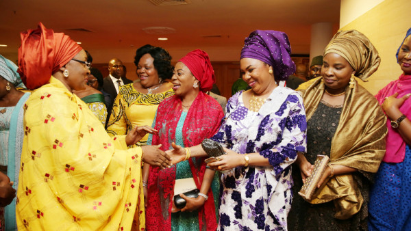 Wife of the President, Mrs Aisha Muhammadu Buhari in a handshake with Some Governors’ wives among whom are, wife of Nassarawa State Governor, Mrs Maro Al-Makura, wife of Katsina State Governor, Hajiya Binta Masari, wife of Imo State Governor, Mrs Nneoma Nkechi Rochas Okorocha