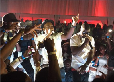Olamide performing