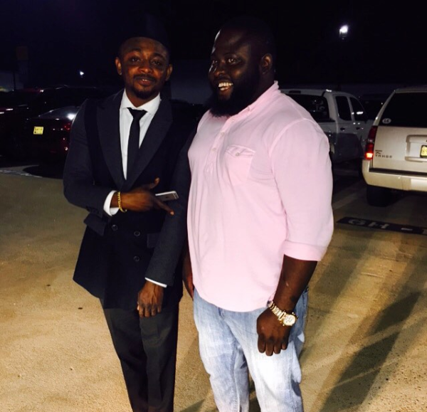 Sean Tizzle and show promoter