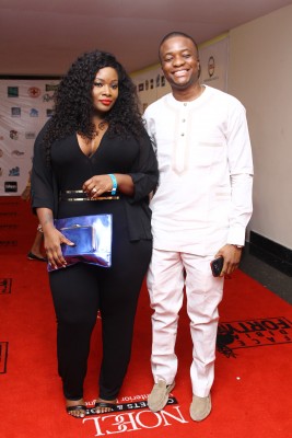 Recently engaged couple, Toolz and Tunde Demuren attend #FORTYfied in loving embrace.