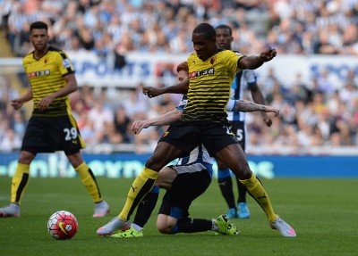 NEWCASTLE UPON TYNE, ENGLAND - SEPTEMBER 19: Odion Ighalo of Watford and Jack Colback of Newcastle United compete for the ball during the Barclays Premier League match between Newcastle United and Watford at St James' Park on September 19, 2015 in Newcastle upon Tyne, United Kingdom. (Photo by Nigel Roddis/Getty Images)
