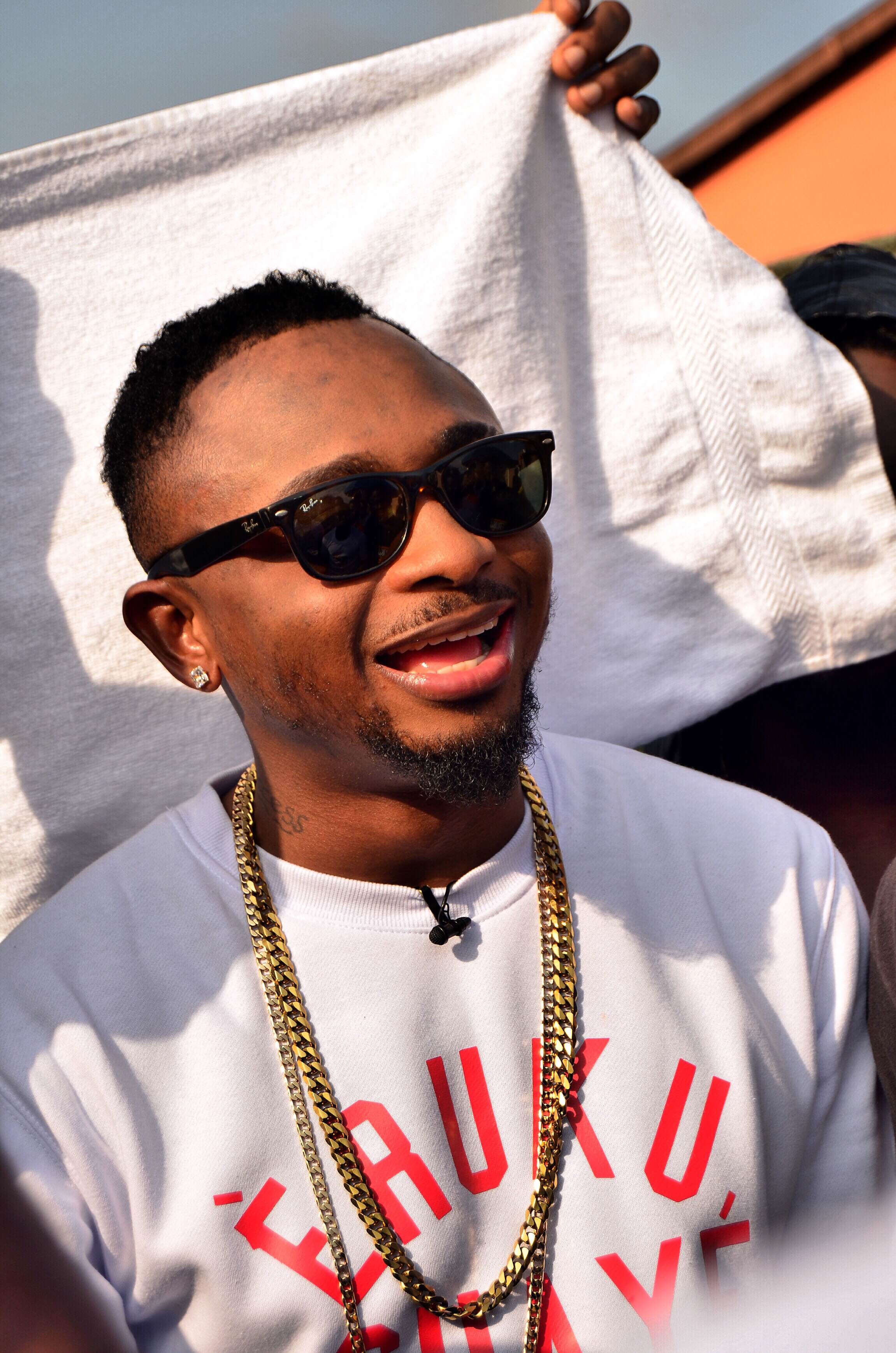 PHOTOS Sean Tizzle shoots video for 'Eruku Saye Po' at Afrika Shrine