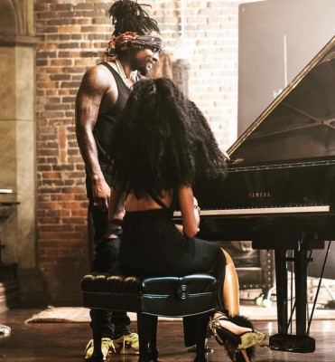 Wale on set of a new video with a mysterious girl as he is rumoured to be dating. Photo: Wale/Instagram