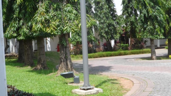 the winding road separating the residence from the chapel