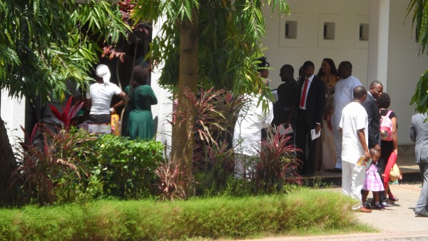 Worshipers mill around after church